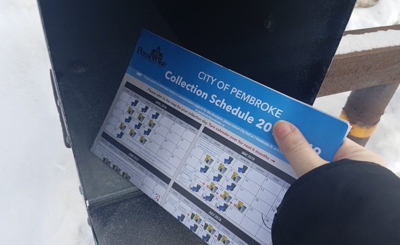collection schedule being delivered in a mailbox